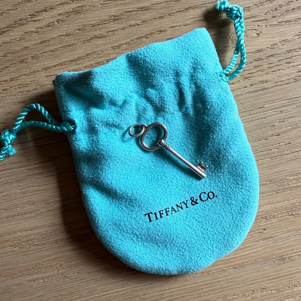 Tiffany & Co. Silver Oval Key Pendant with Blue Pouch
